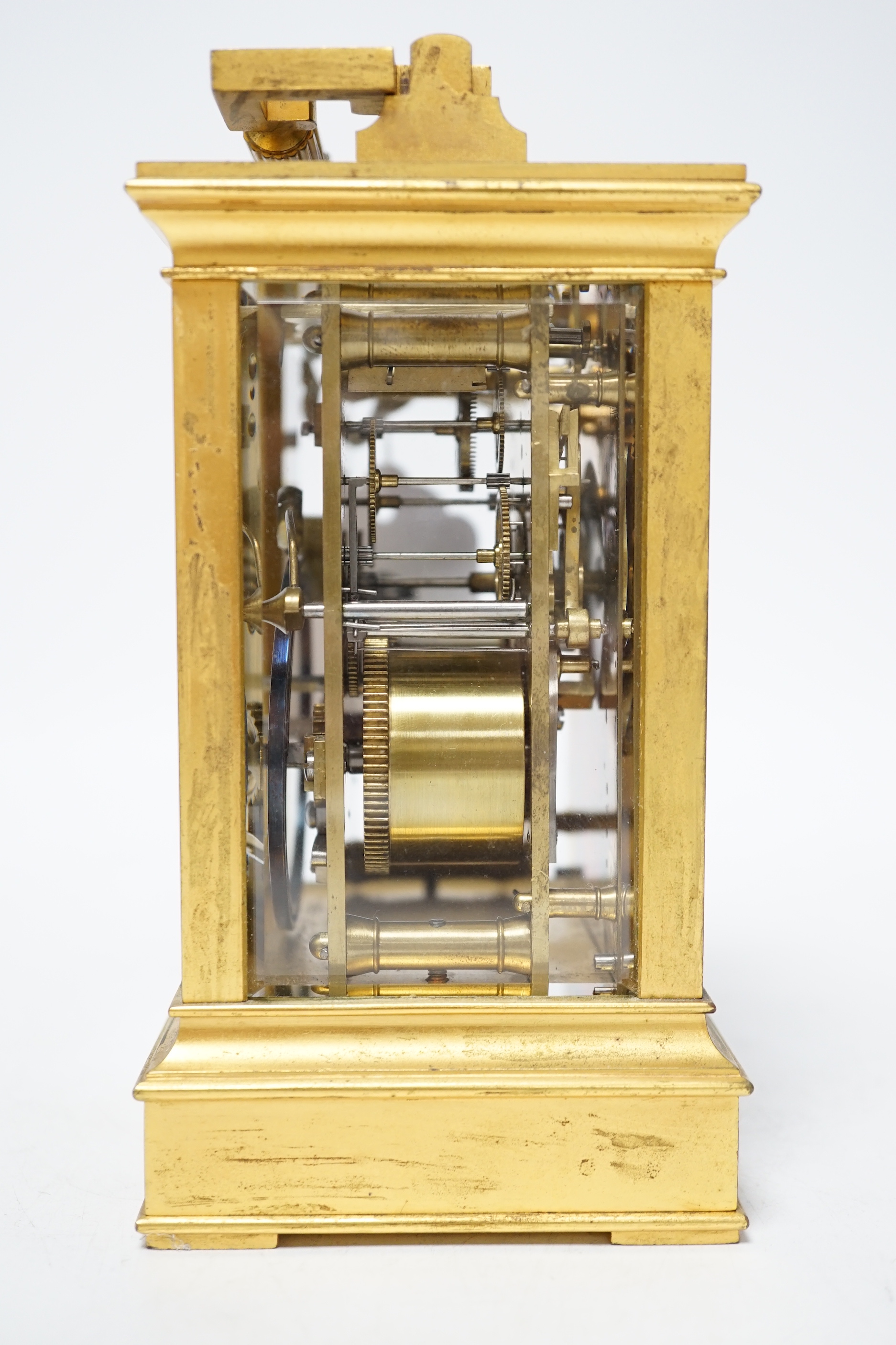 A late 19th century French gilt brass cased eight day repeating carriage clock with key, 17cm